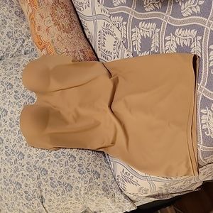 Nude 34B Victoria's Secret strapless bodysuit.